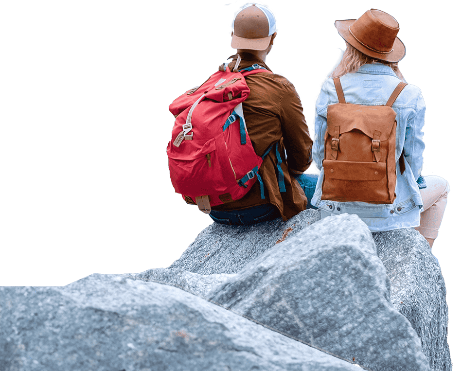 Backpack travellers sitting on mountain