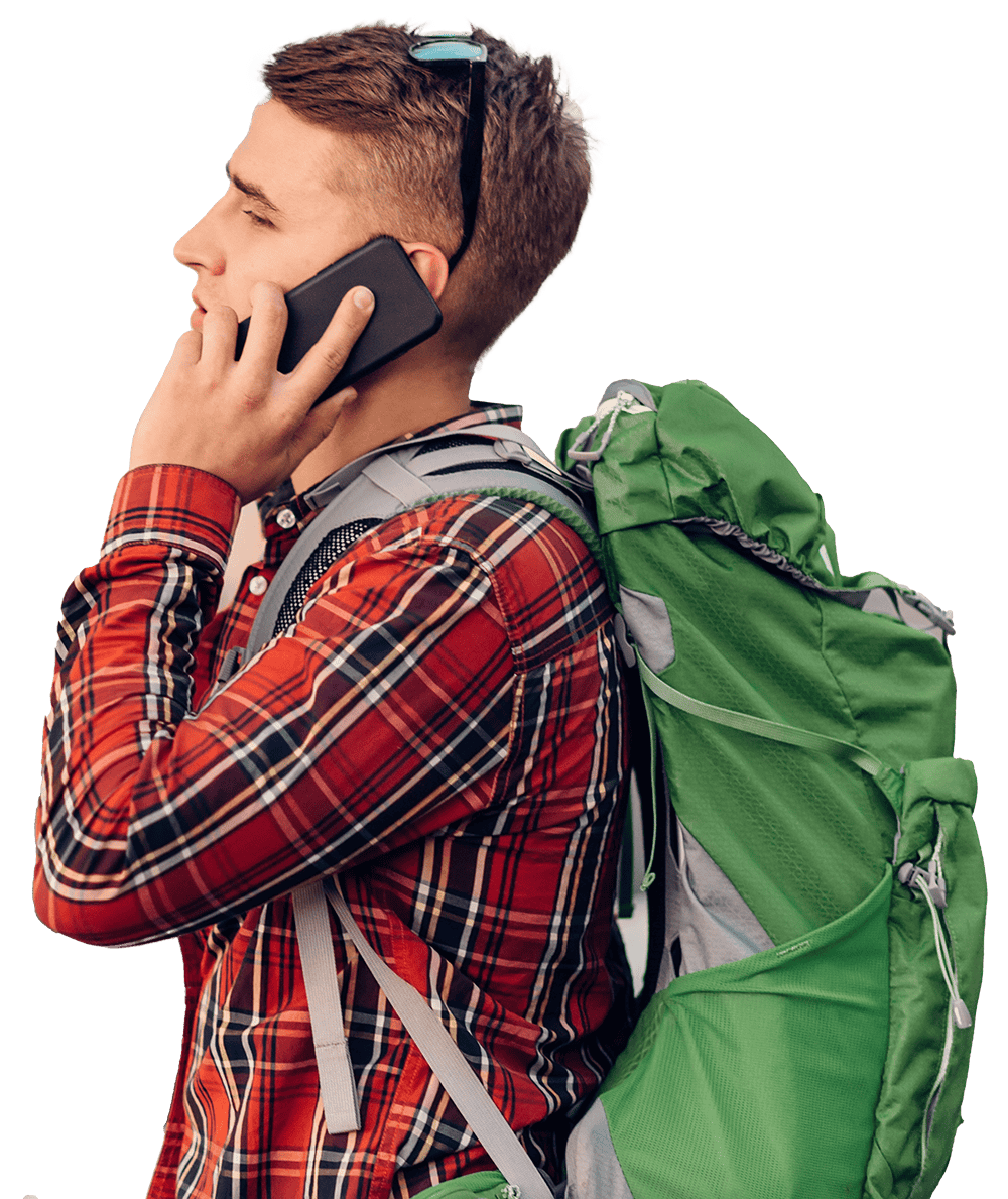 Male backpacker on cell phone